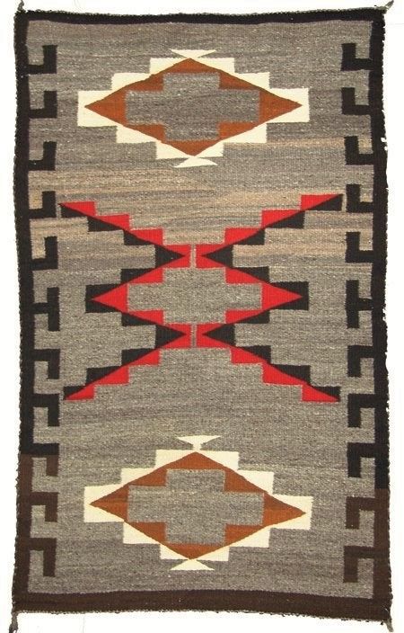 SOLD<br /><br />
DESCRIPTION:  A great early Hubbell design Ganado wool rug with hooked edges and crisp geometric designs in red, white and black on a grey ground, C. 1920.  Very good condition, clean and flat. DIMENSIONS:  34" x 60"

<div id='rater_target1423901'></div>
